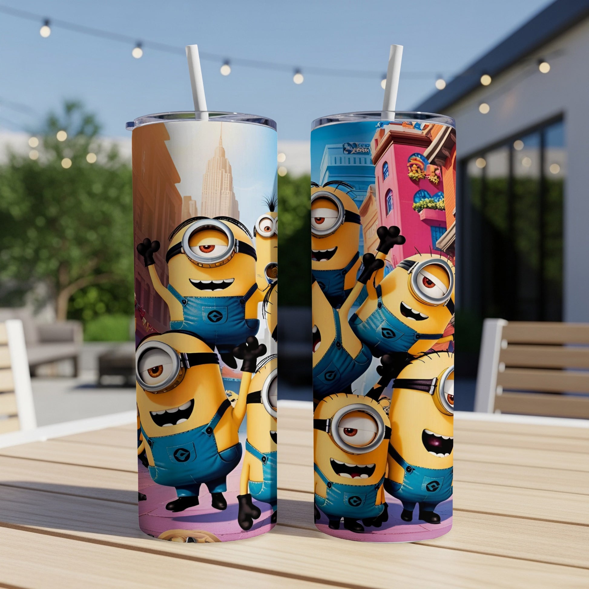 Two Minions tumblers with a city skyline and buildings in the background.