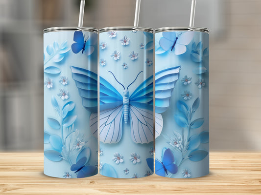 Blue butterfly and floral design on three tumblers.
