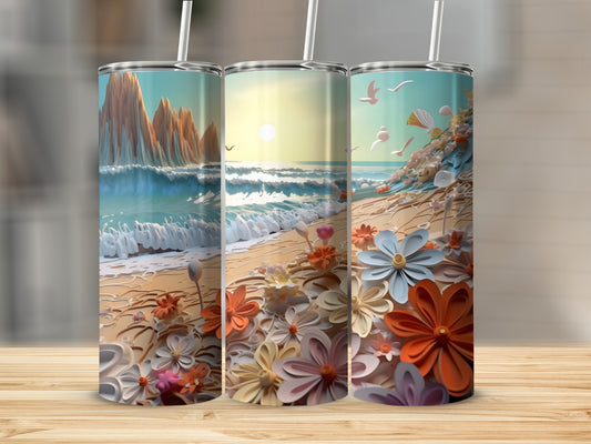 Three tumblers with beach and floral artwork, displayed on a wooden surface.