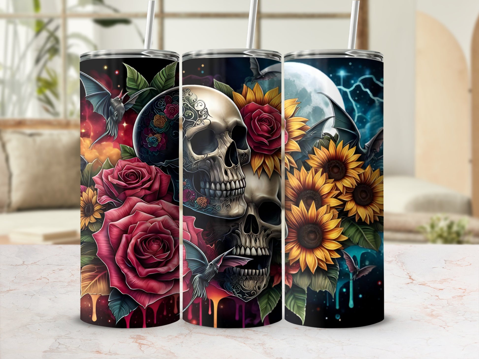 Three tumblers with skulls, roses, sunflowers, bats, and moons.