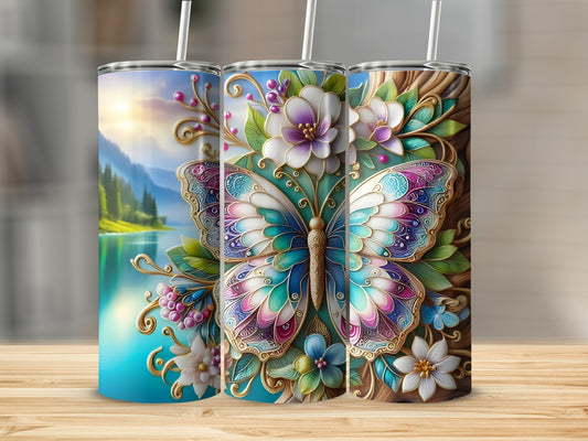 Three tumblers with butterfly and floral designs, on a wooden surface.