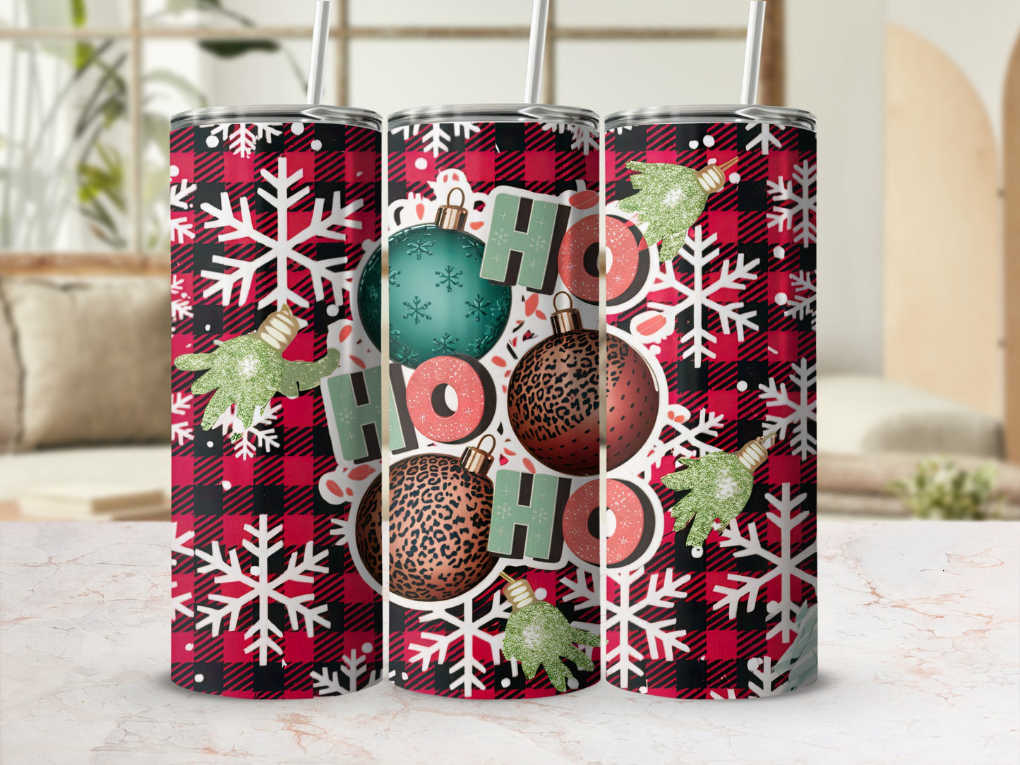 Tumbling tumbler with red plaid, snowflakes, and "HO HO HO" holiday design.