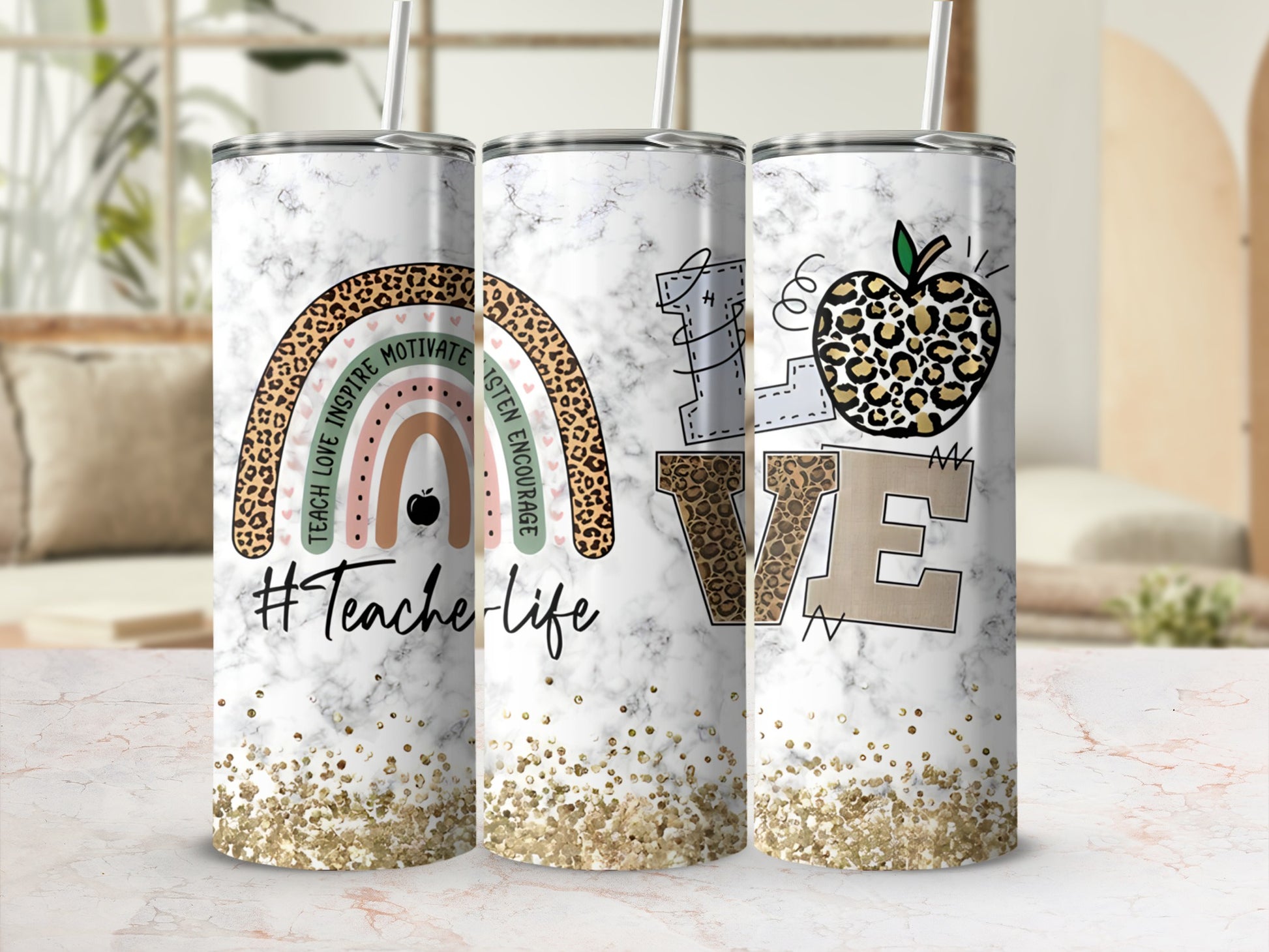 Marble tumbler with rainbow, leopard print apple, and "#Teache-life" text.