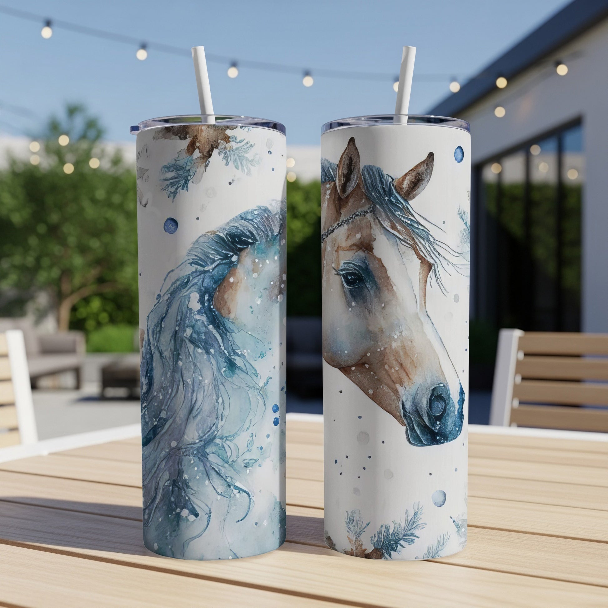 Two tall tumblers with watercolor horse illustrations and floral accents.