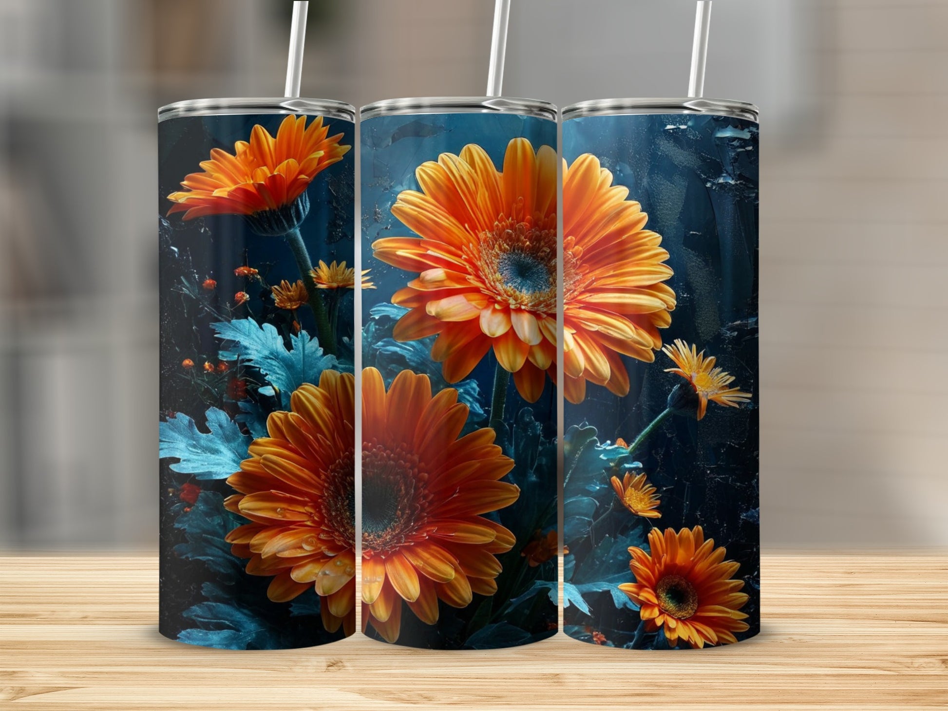Three tumblers with close-up orange gerbera daisies on a dark background.