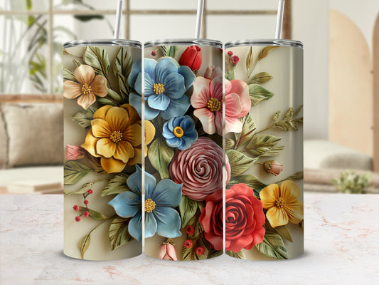 3D floral pattern on a tapered tumbler with straws.
