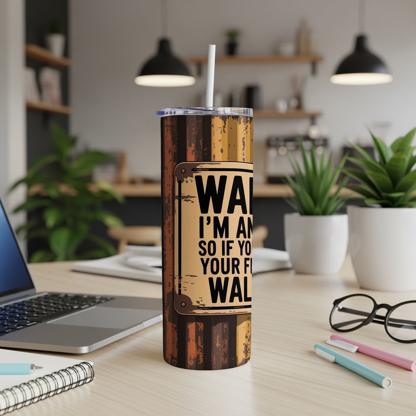 Distressed wooden sign on a tumbler that reads "WARNING I'M AN ARTIST SO IF YOU DON'T LIKE MY ART GET OUT OF MY STUDIO".