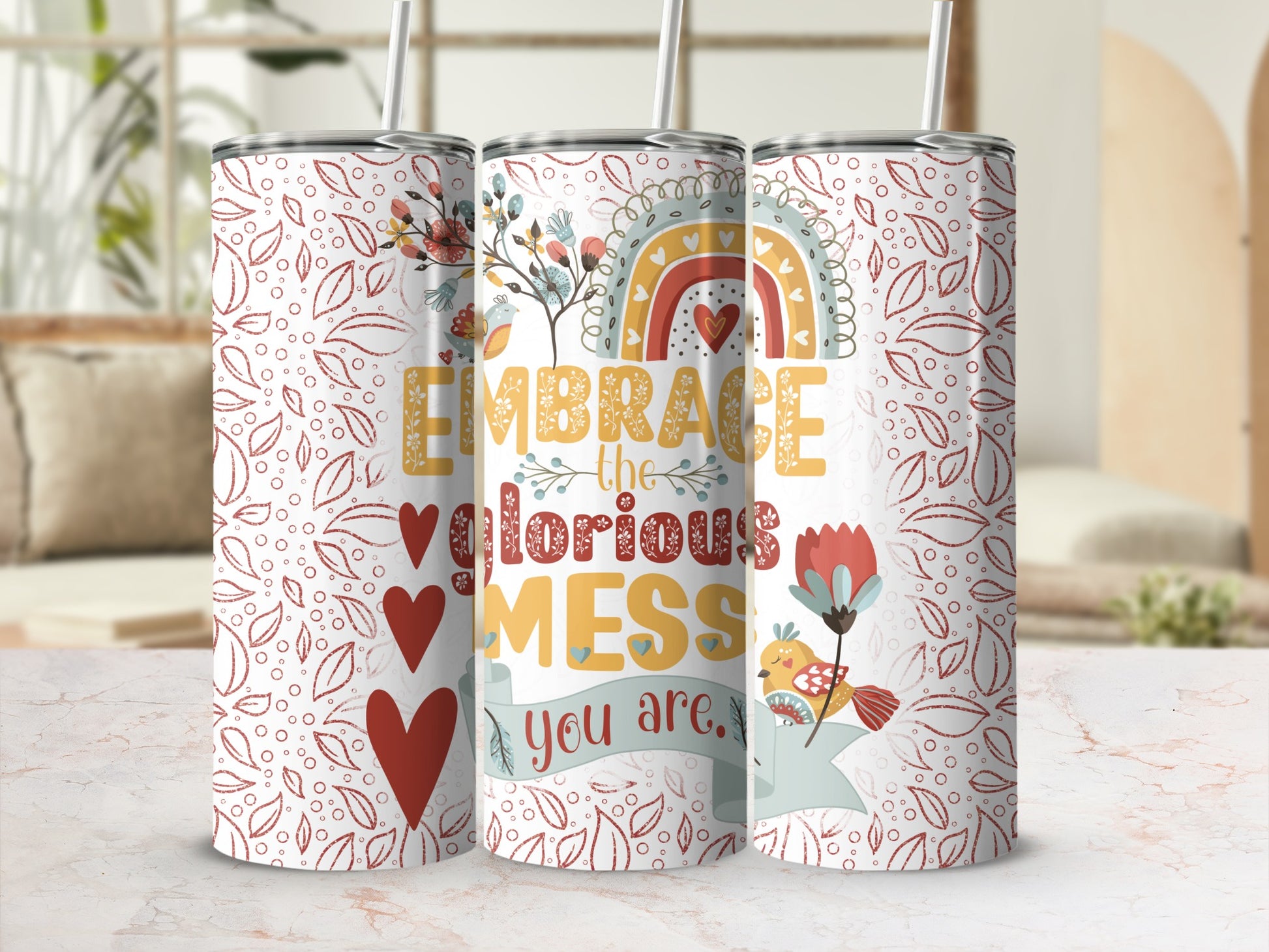 Tumbler with rainbow, birds, hearts, and "EMBRACE the glorious MESS you are."