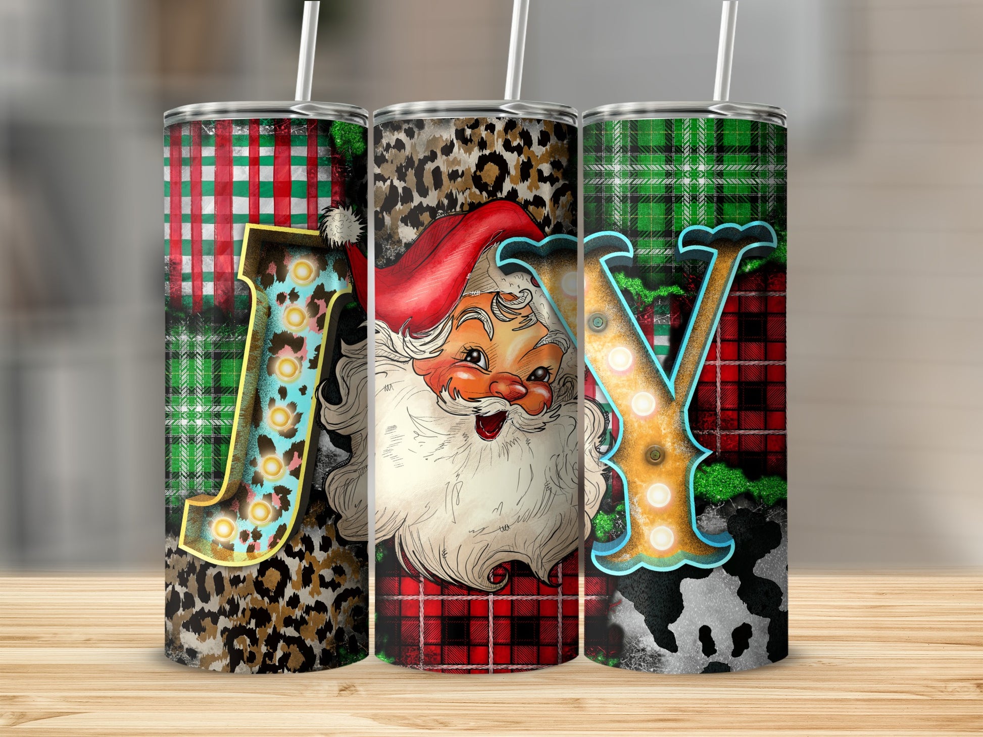 Santa Claus tumbler with "JOY" lettering and holiday plaid patterns.