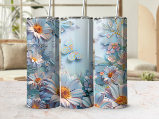 Floral and butterfly design on a set of three insulated tumblers.