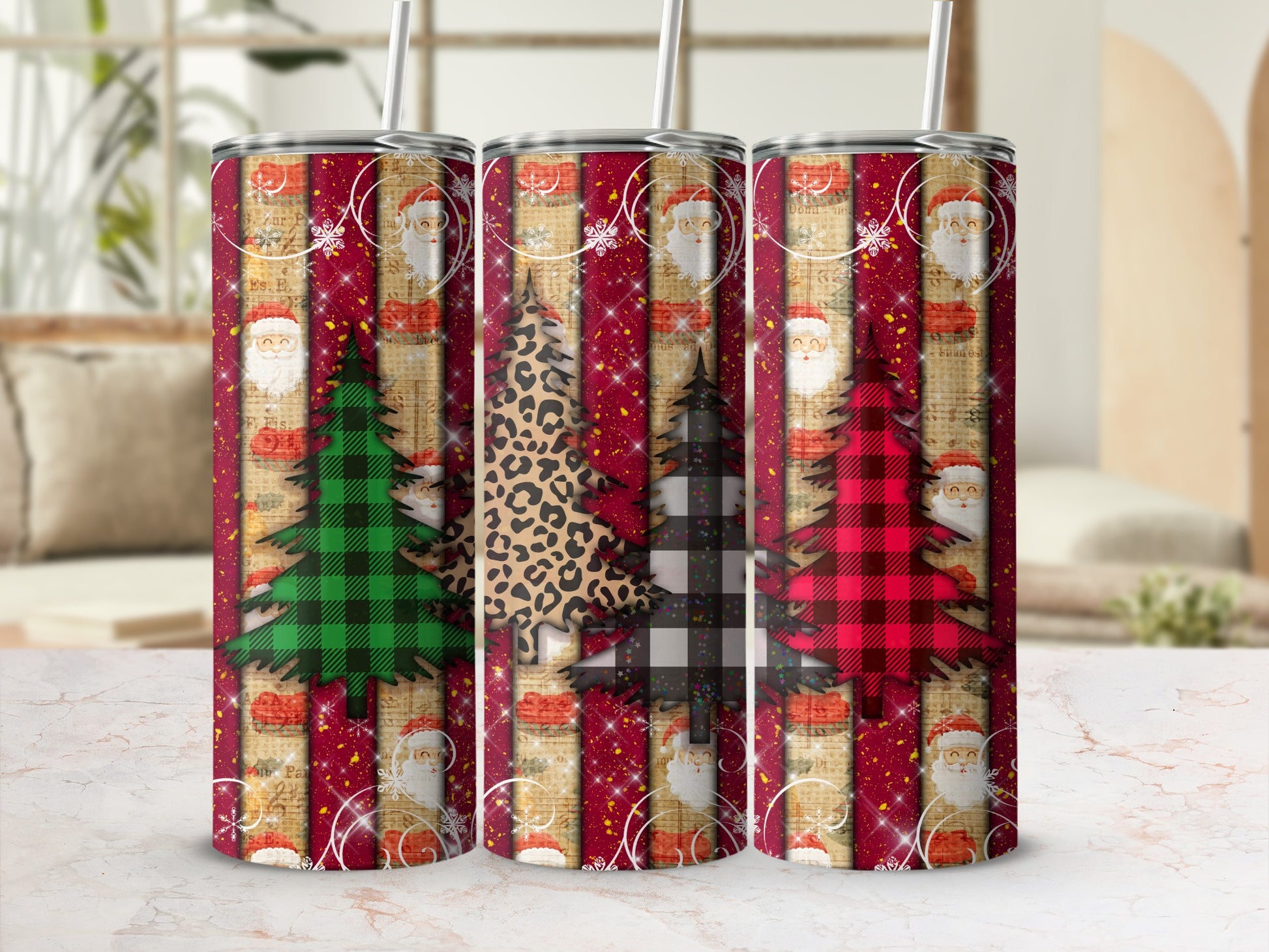 Three Christmas-themed tumblers with Santa, trees, and festive patterns.