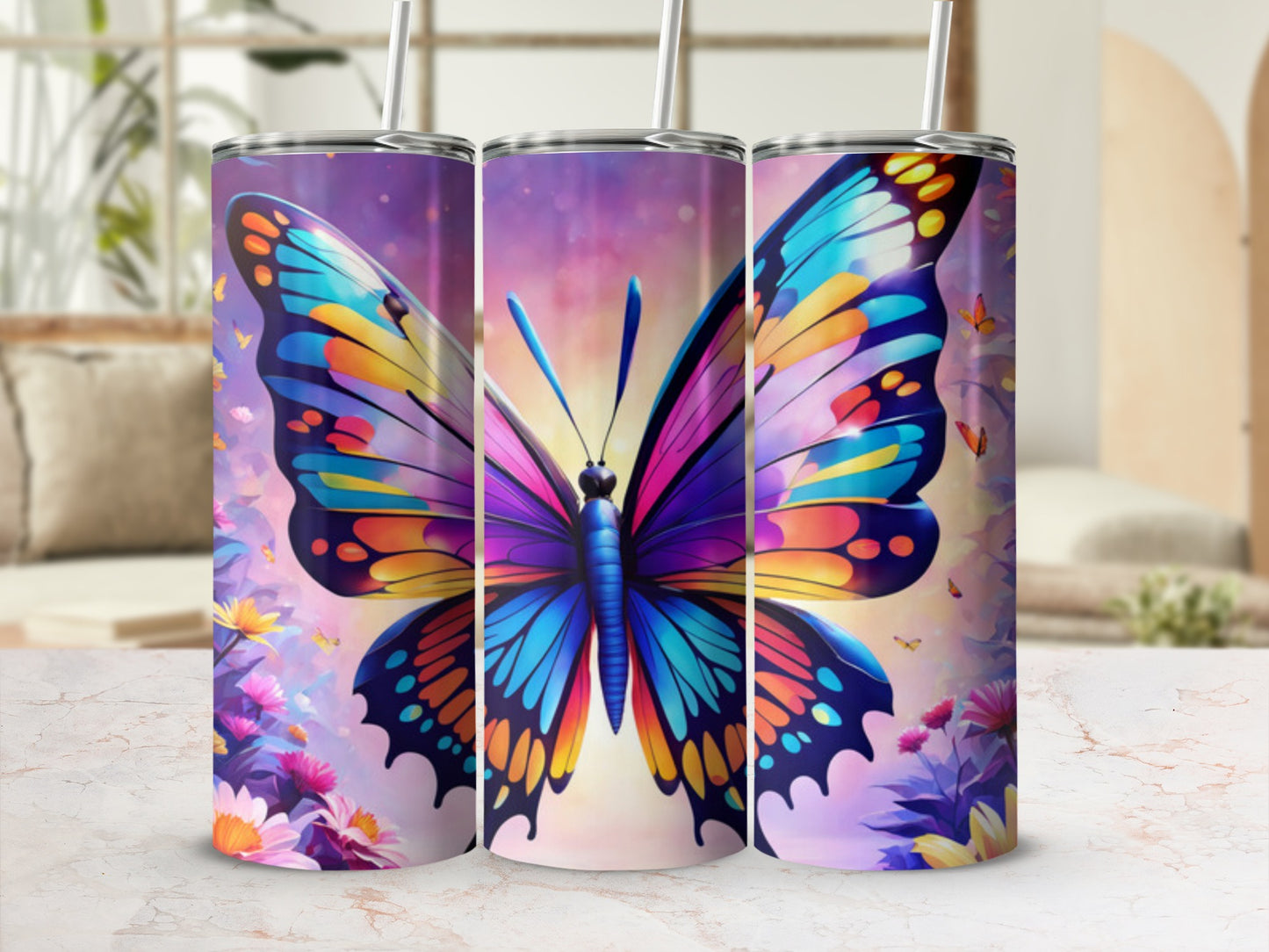 Three tumblers featuring a vibrant butterfly and floral design.