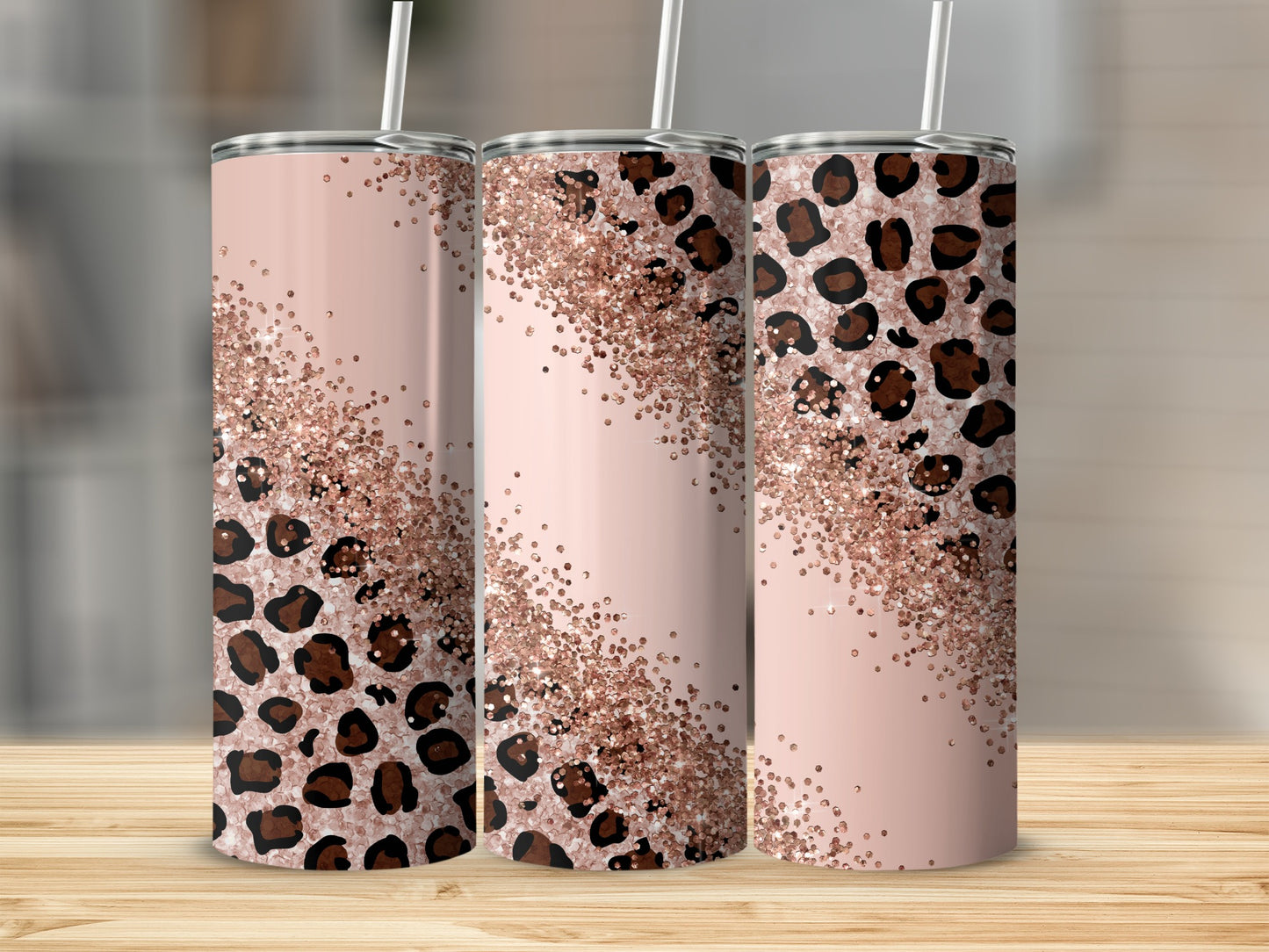 Three tumblers with rose gold glitter and leopard print design.