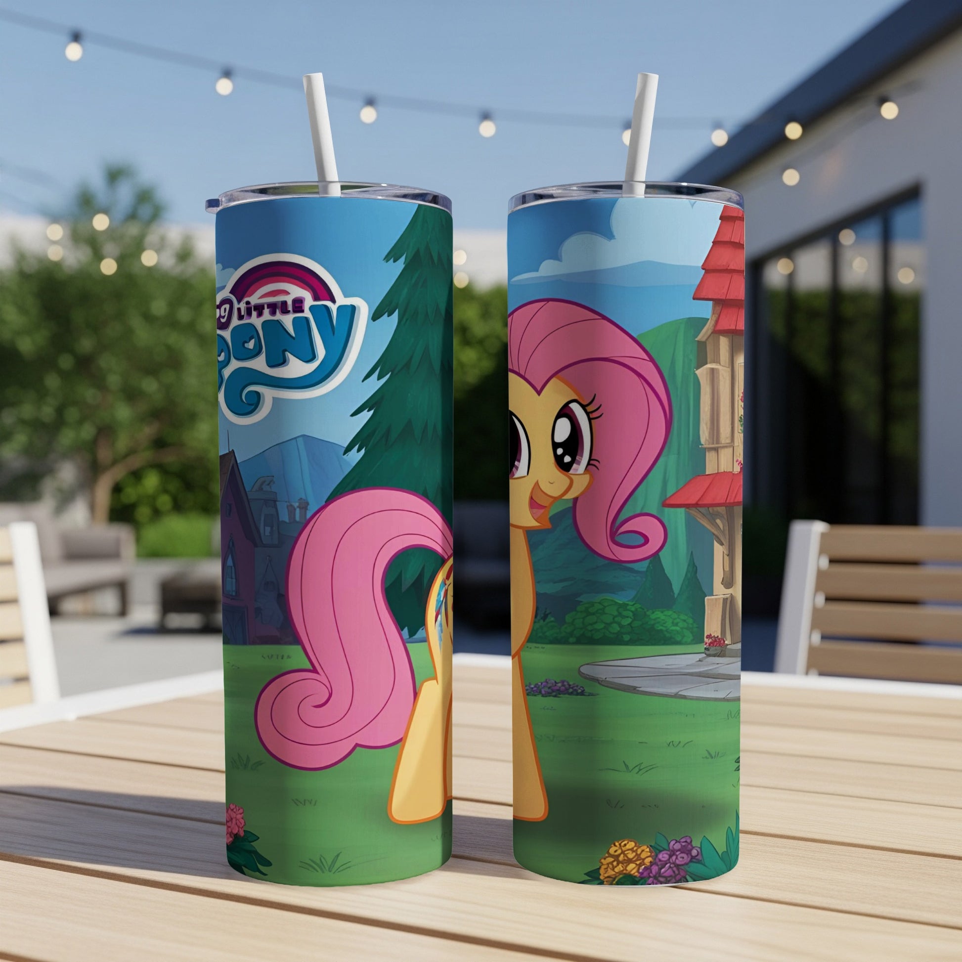 My Little Pony Fluttershy character on a blue skinny tumbler with a straw.
