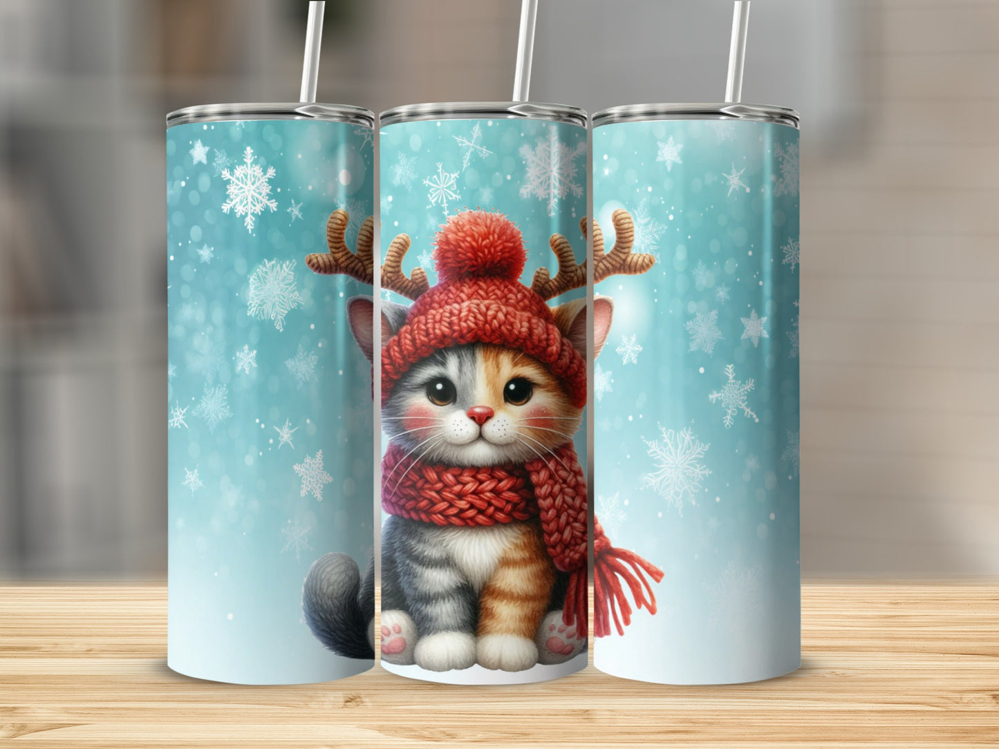 Christmas cat with antlers, scarf, and hat on a tumbler.
