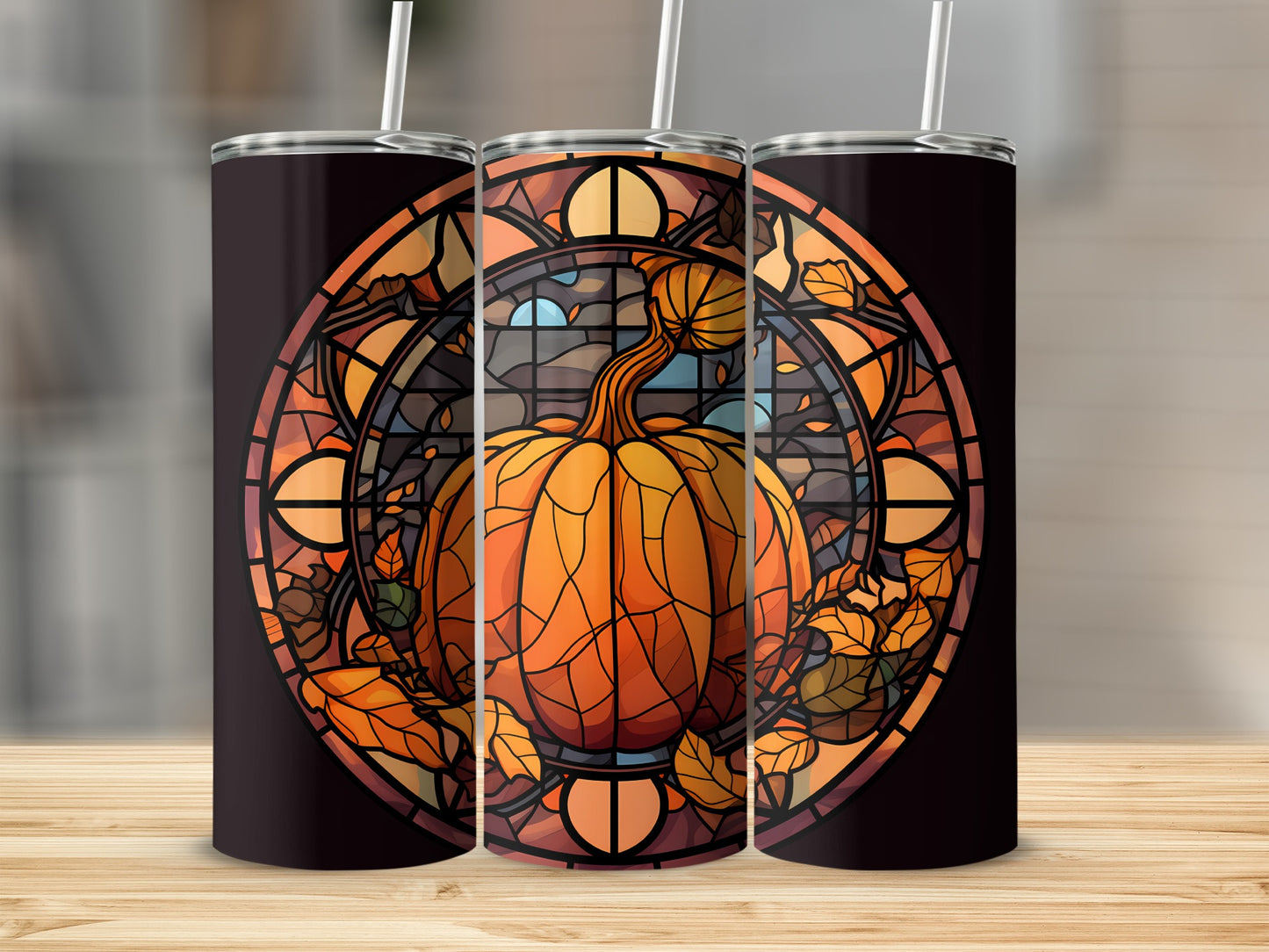 Stained glass pumpkin tumbler with autumn leaves and floral border.