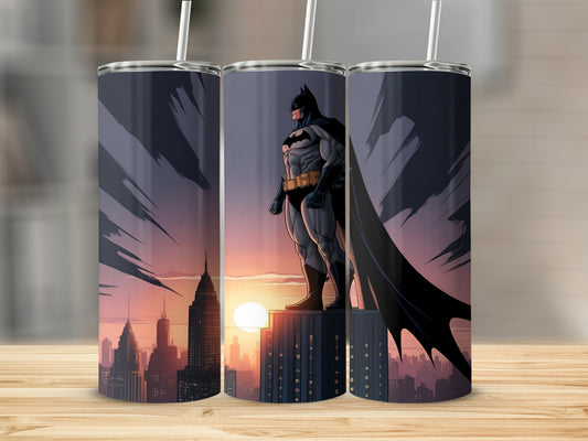 Batman standing on a skyscraper overlooking a city at sunset.