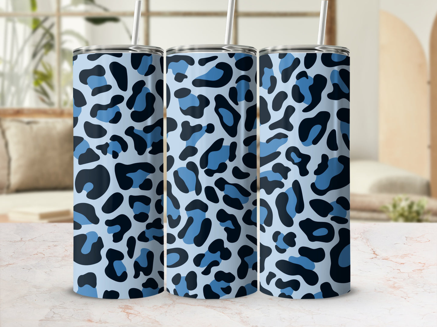 Three tumblers with a light blue and dark blue leopard print pattern.