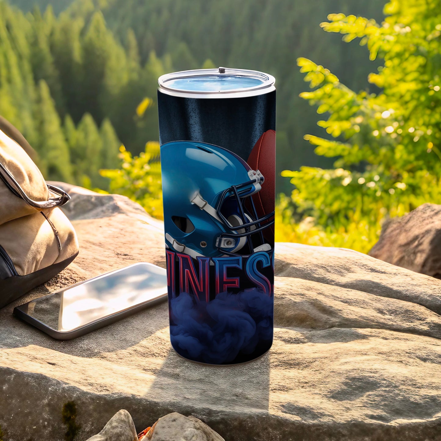 Tumbler with football helmet, ball, and "NINERS" text on rocky outdoor surface.