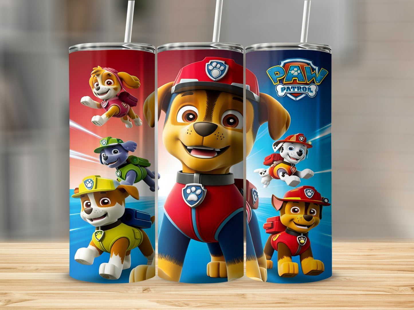 Paw Patrol characters Chase, Marshall, and Skye on a stainless steel tumbler.
