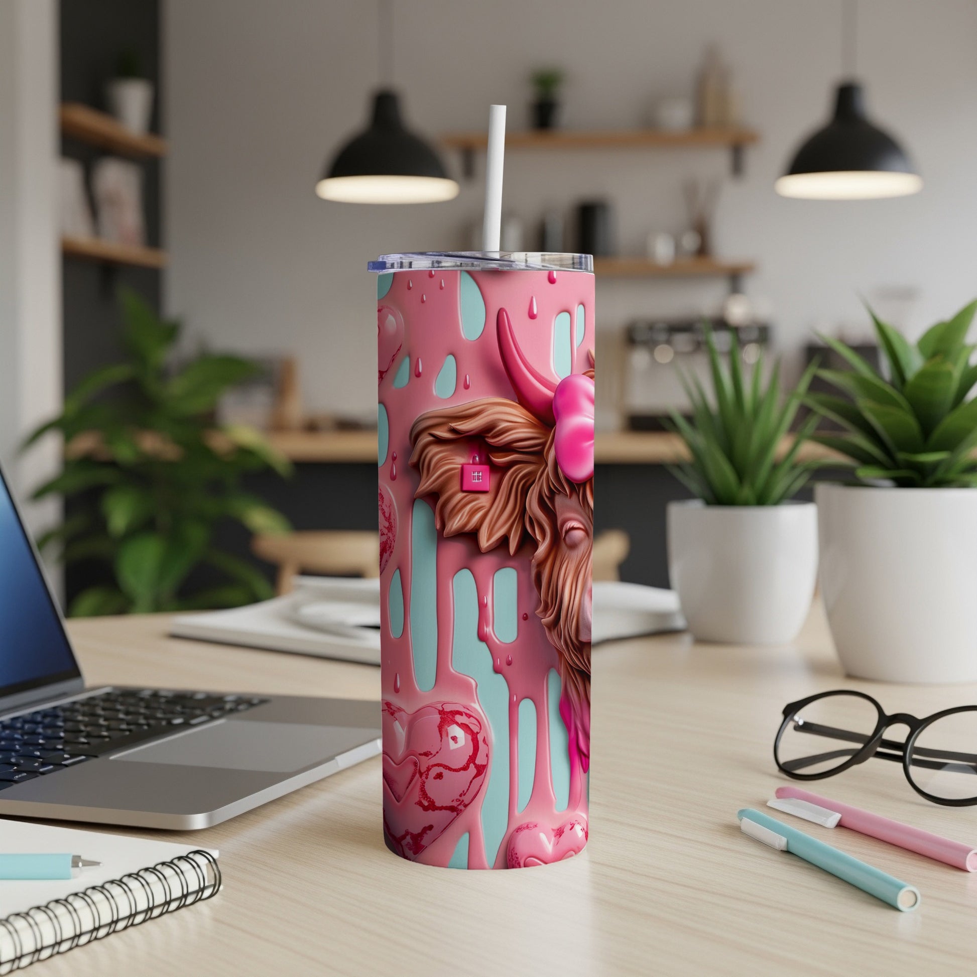 Pink tumbler with a highland cow design and heart accents.