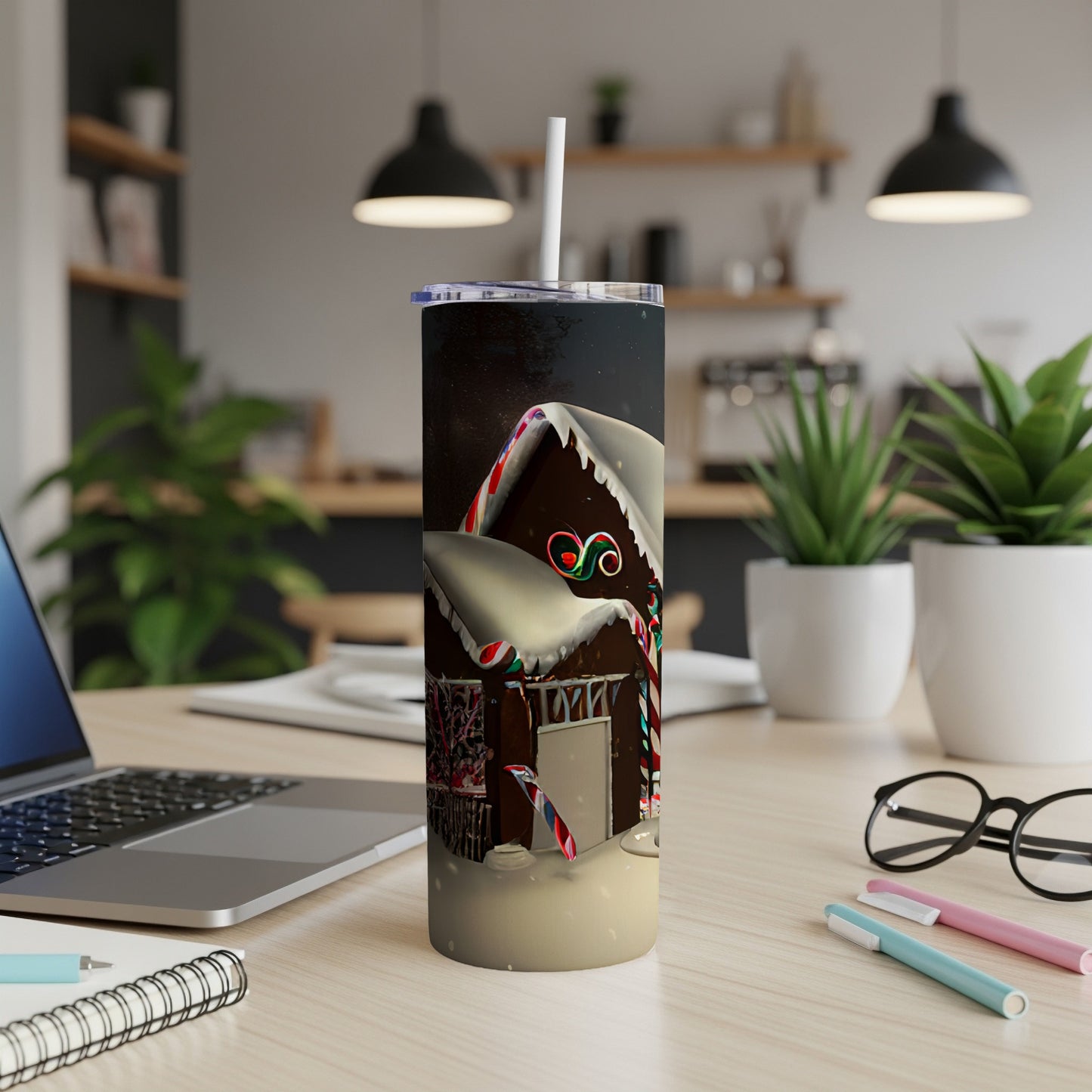 Gingerbread house with candy canes on a snowy background, on a tumbler.