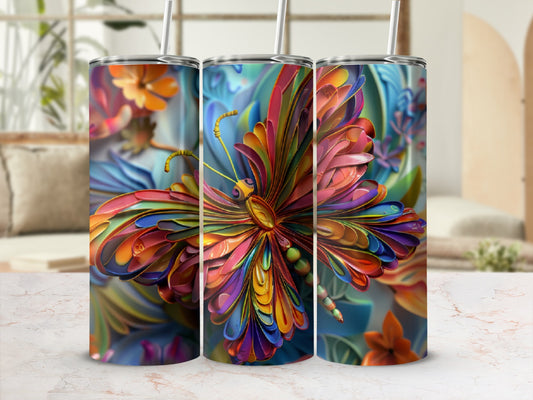 Colorful butterfly tumbler with straw on marbled surface.
