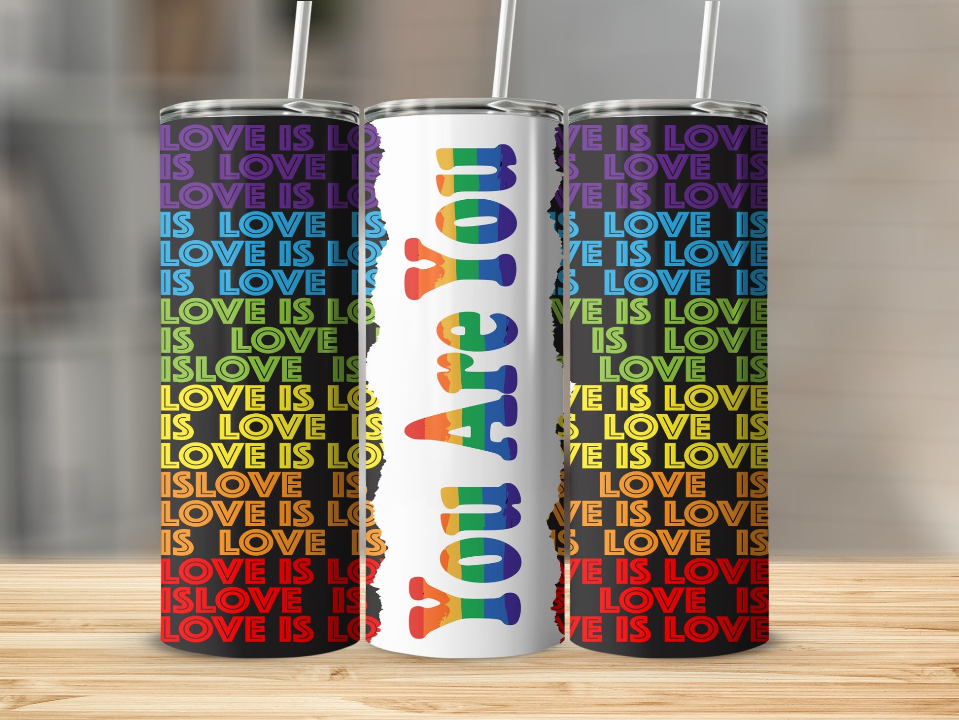 Tumbler with "You Are You" and "Love Is Love" repeated in rainbow colors.