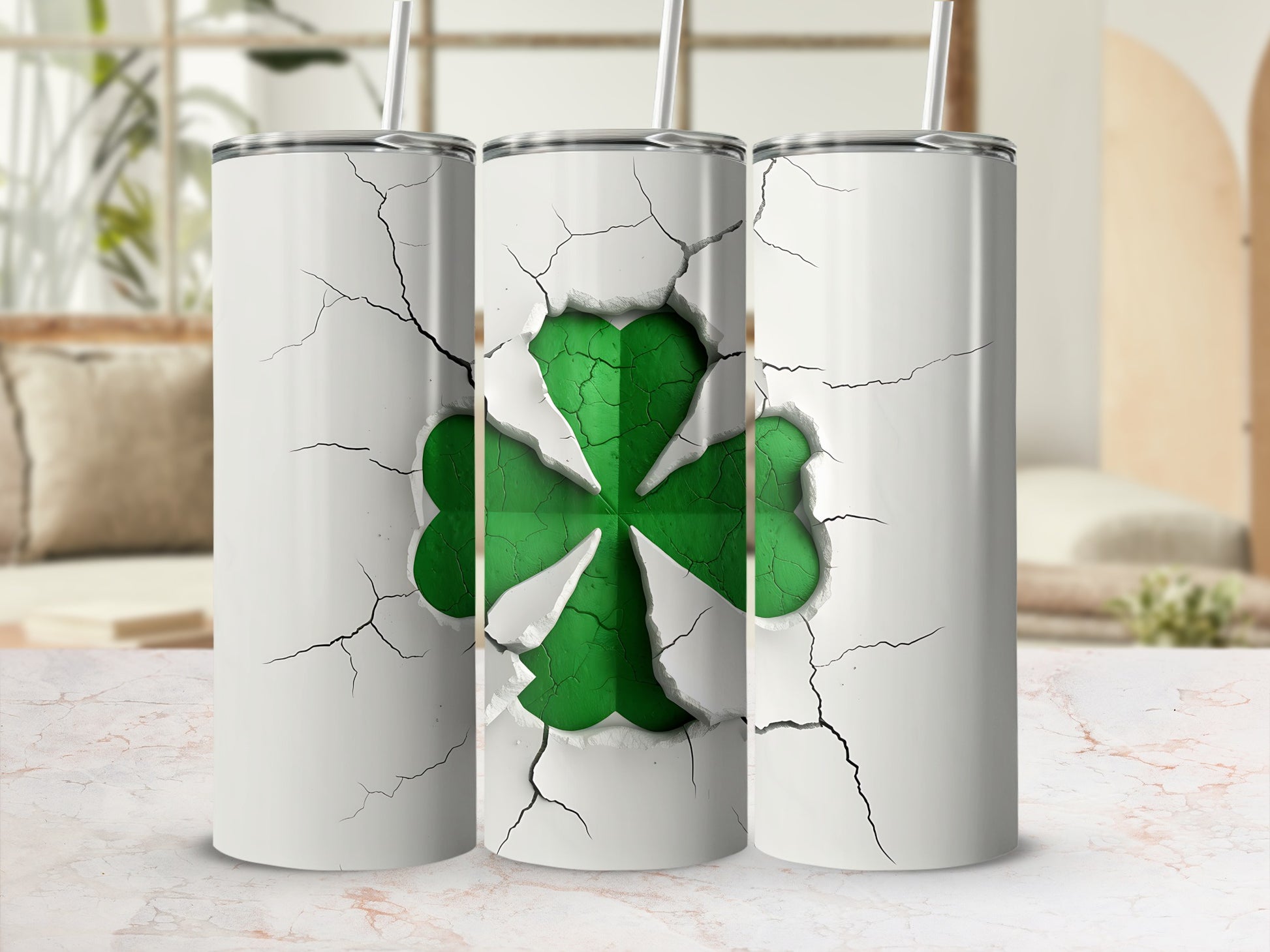 Three white tumblers with cracked surfaces revealing a green shamrock design.