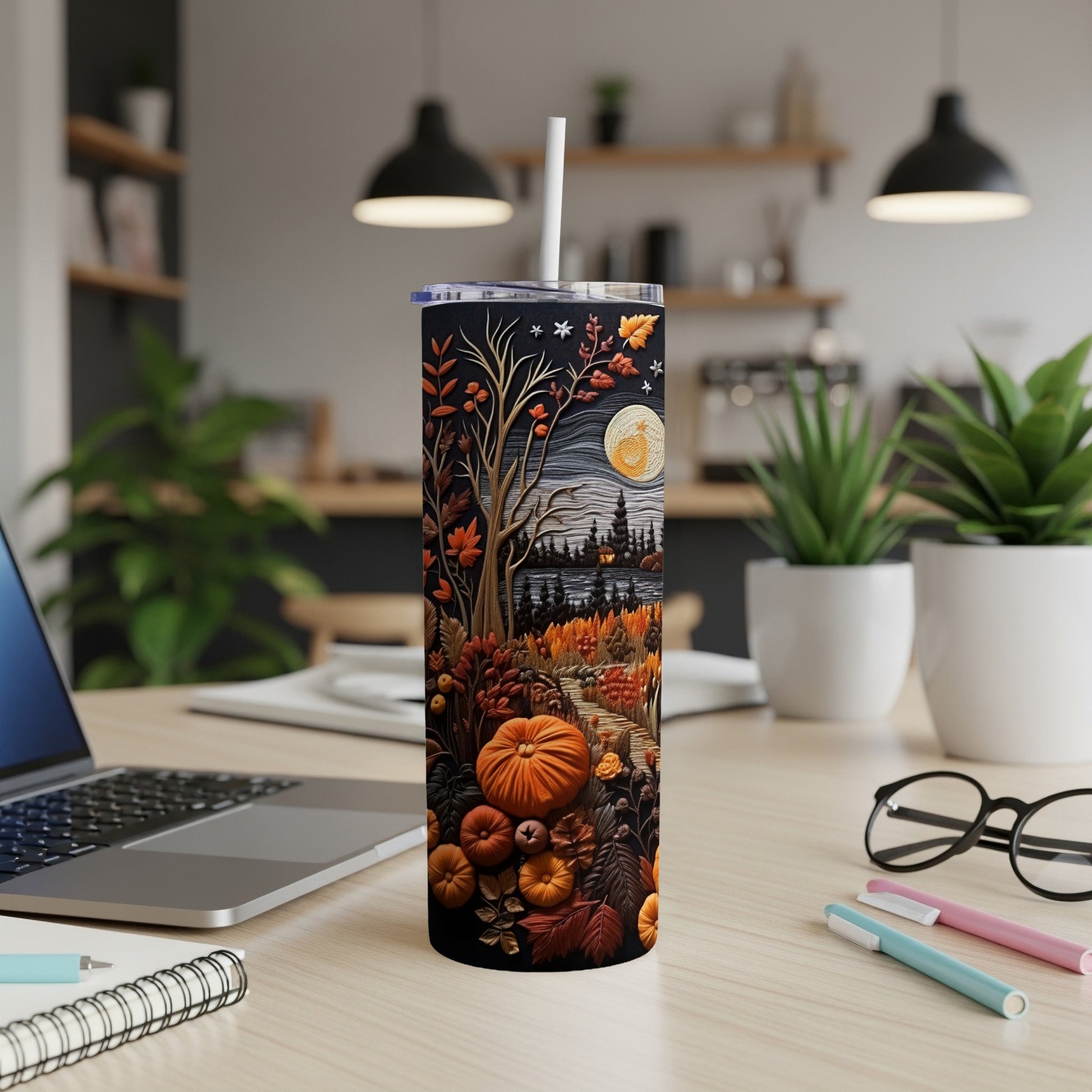 Black tumbler with a detailed autumn harvest scene featuring pumpkins and fall foliage.