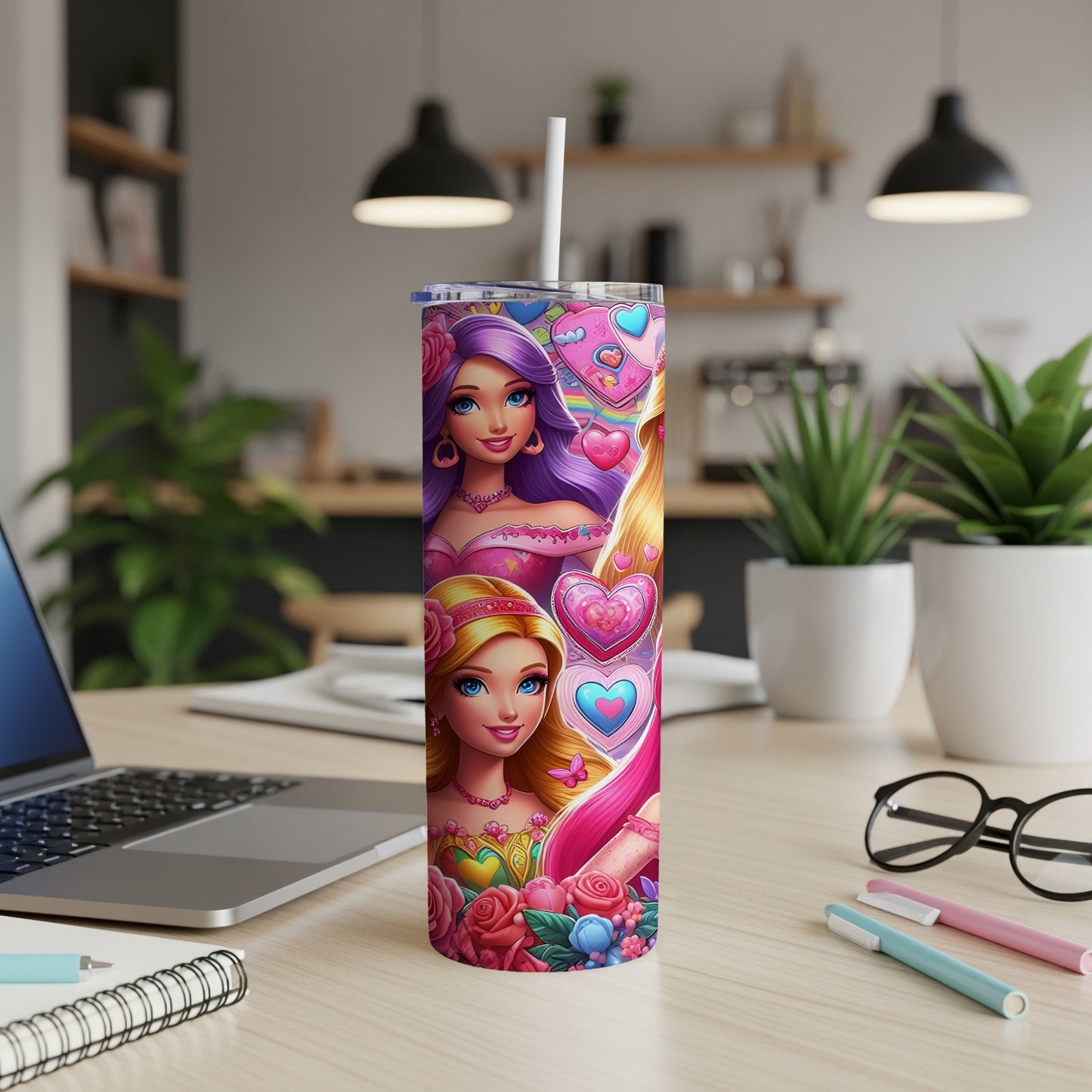Pink tumbler with Barbie-like characters and hearts, on a desk.