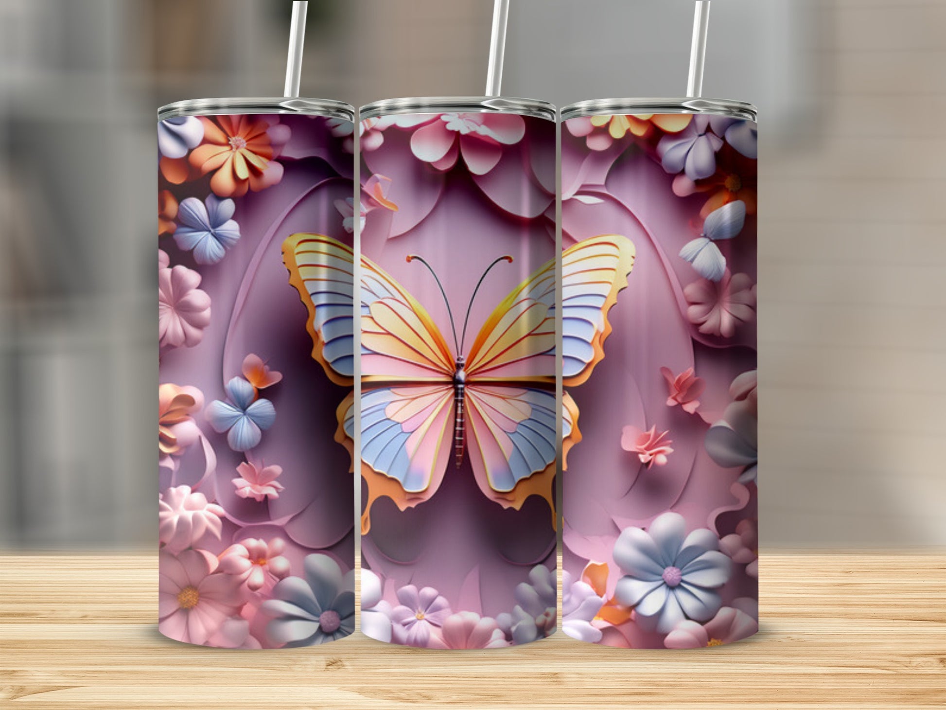 3D butterfly and floral pattern on three tumblers.