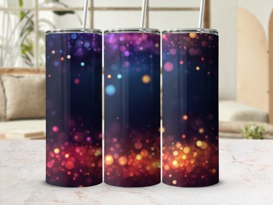 Three tumblers with colorful bokeh lights on a marbled surface.