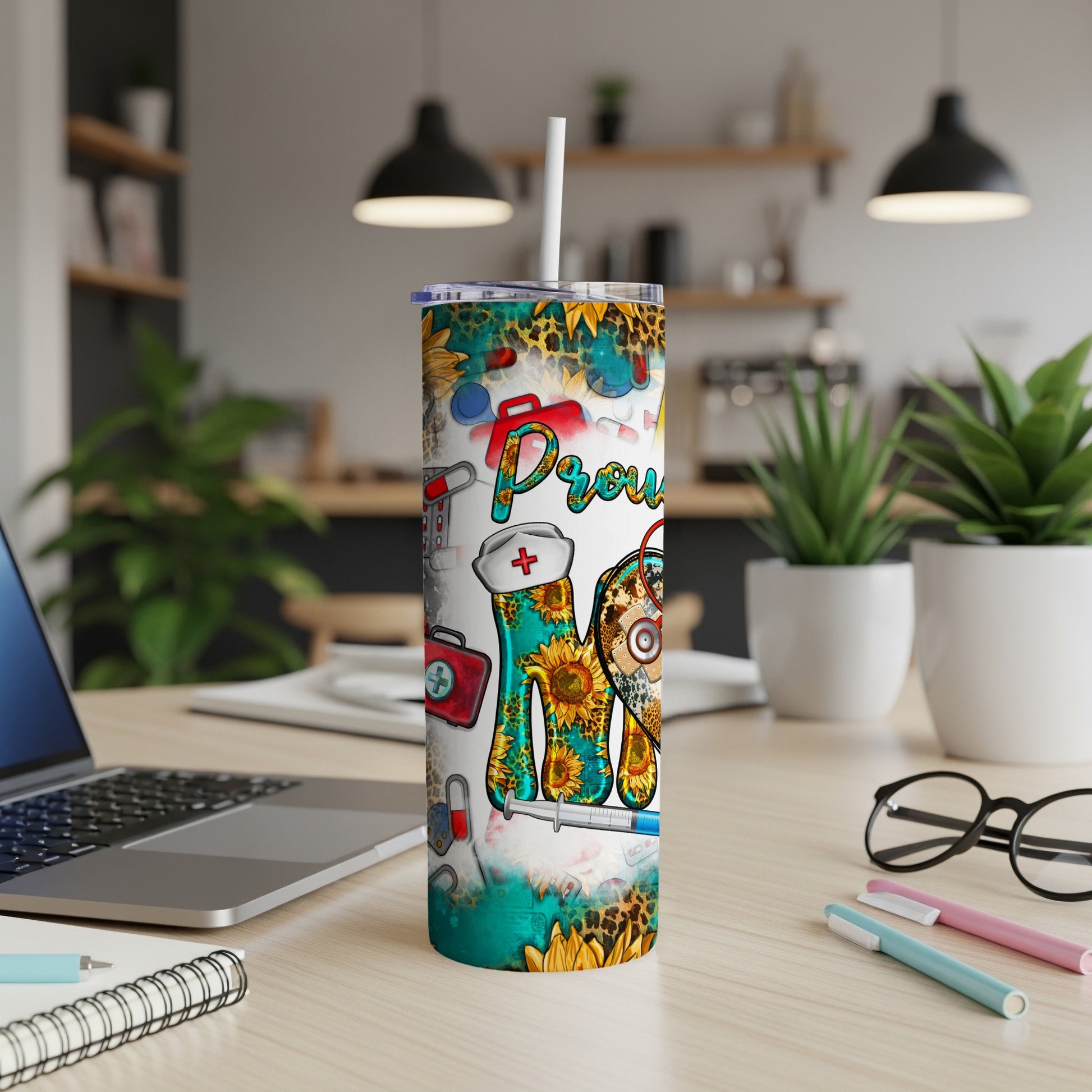 Proud Nurse tumbler with sunflowers and medical symbols.