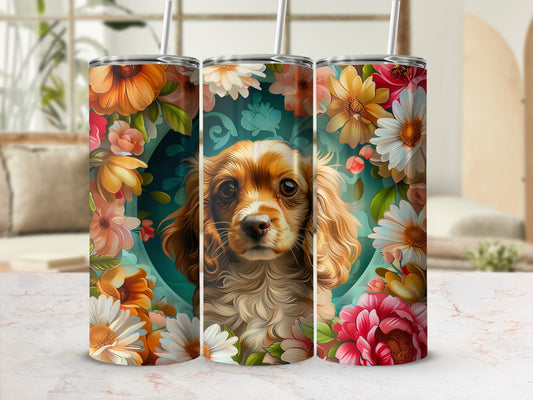 Golden retriever puppy surrounded by floral art on a tumbler.
