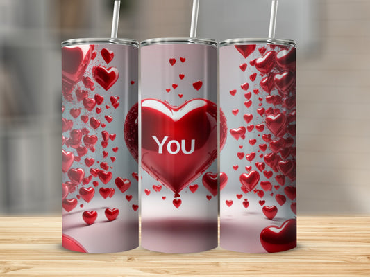 Tumbler with red heart pattern, "You" text on center heart.
