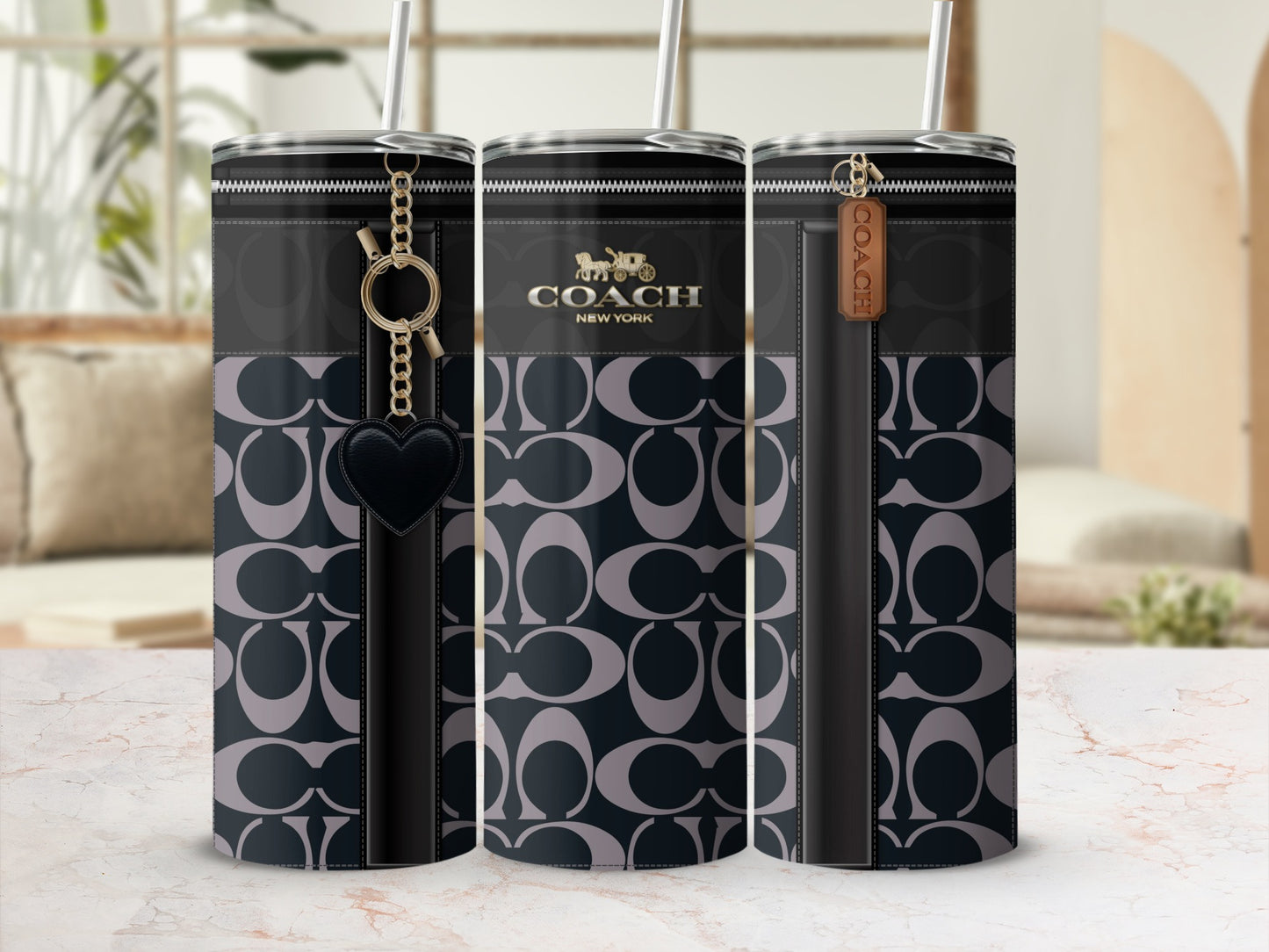 Coach New York monogram tumbler with keychain accessory