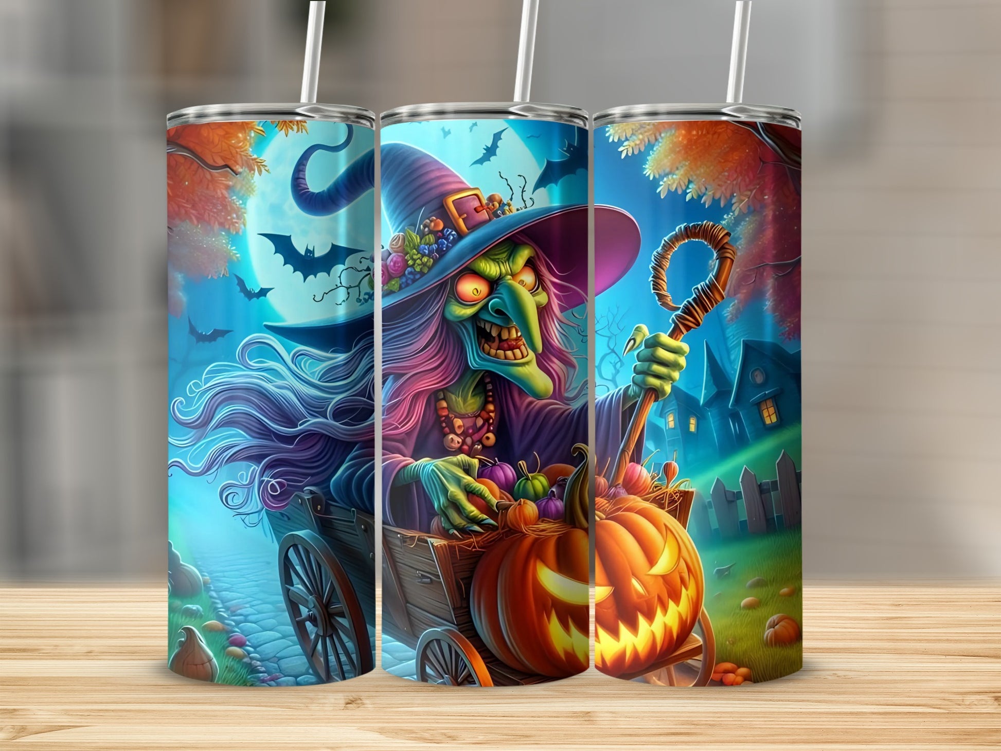 Halloween tumblers with a witch in a wagon filled with pumpkins and gourds.