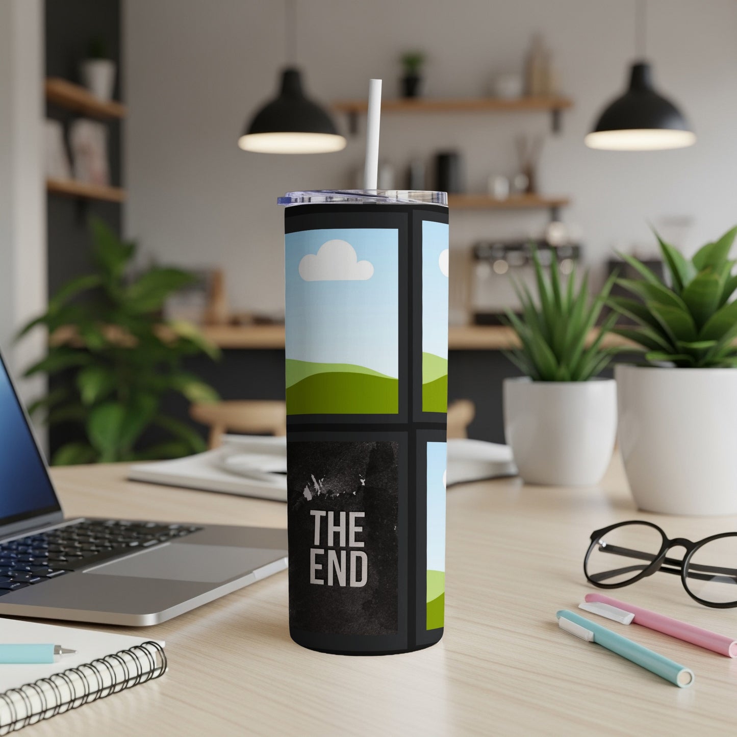 Tumbler with a scenic landscape design and "The End" text.