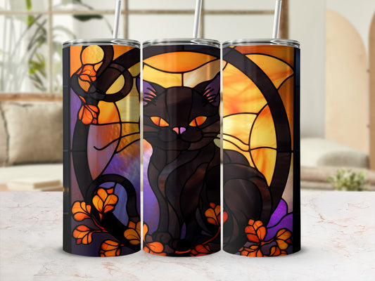 Black cat with orange eyes on a stained-glass background with autumn leaves.