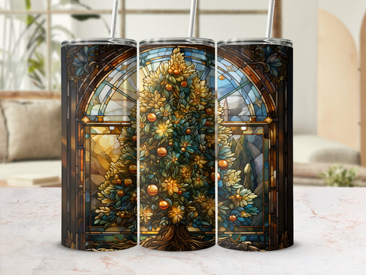Three tumblers featuring a stained glass Christmas tree and a window scene.