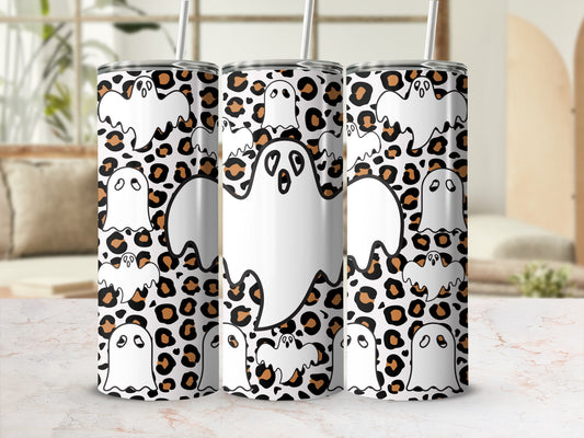Three tumblers with white ghosts and leopard print pattern.