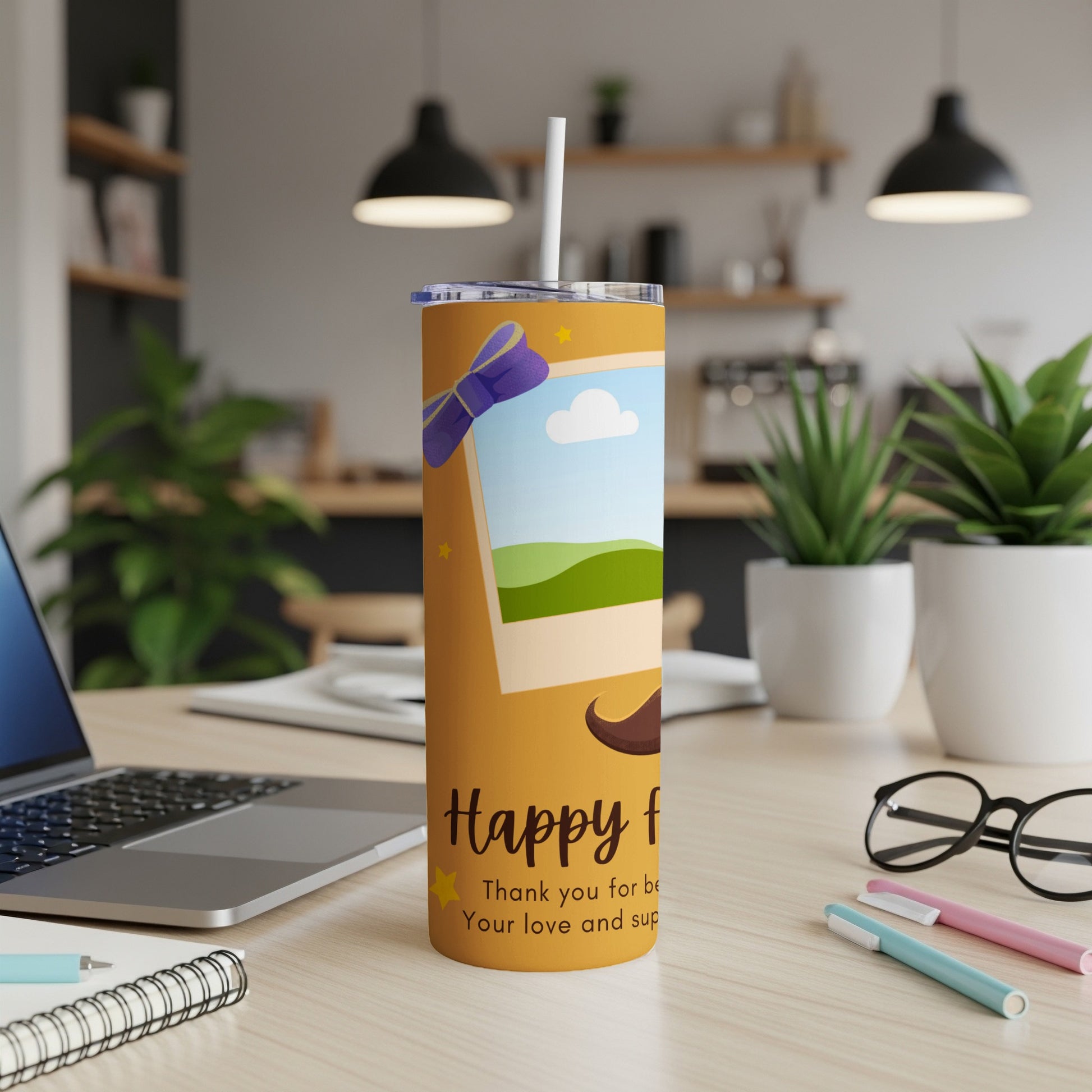 Orange tumbler with "Happy f" text, a photo frame, and mustache graphic.