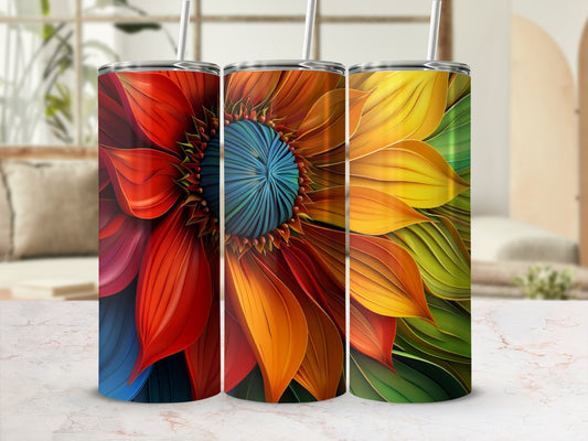 Three abstract floral tumblers with colorful gradient petals against a blurred background.