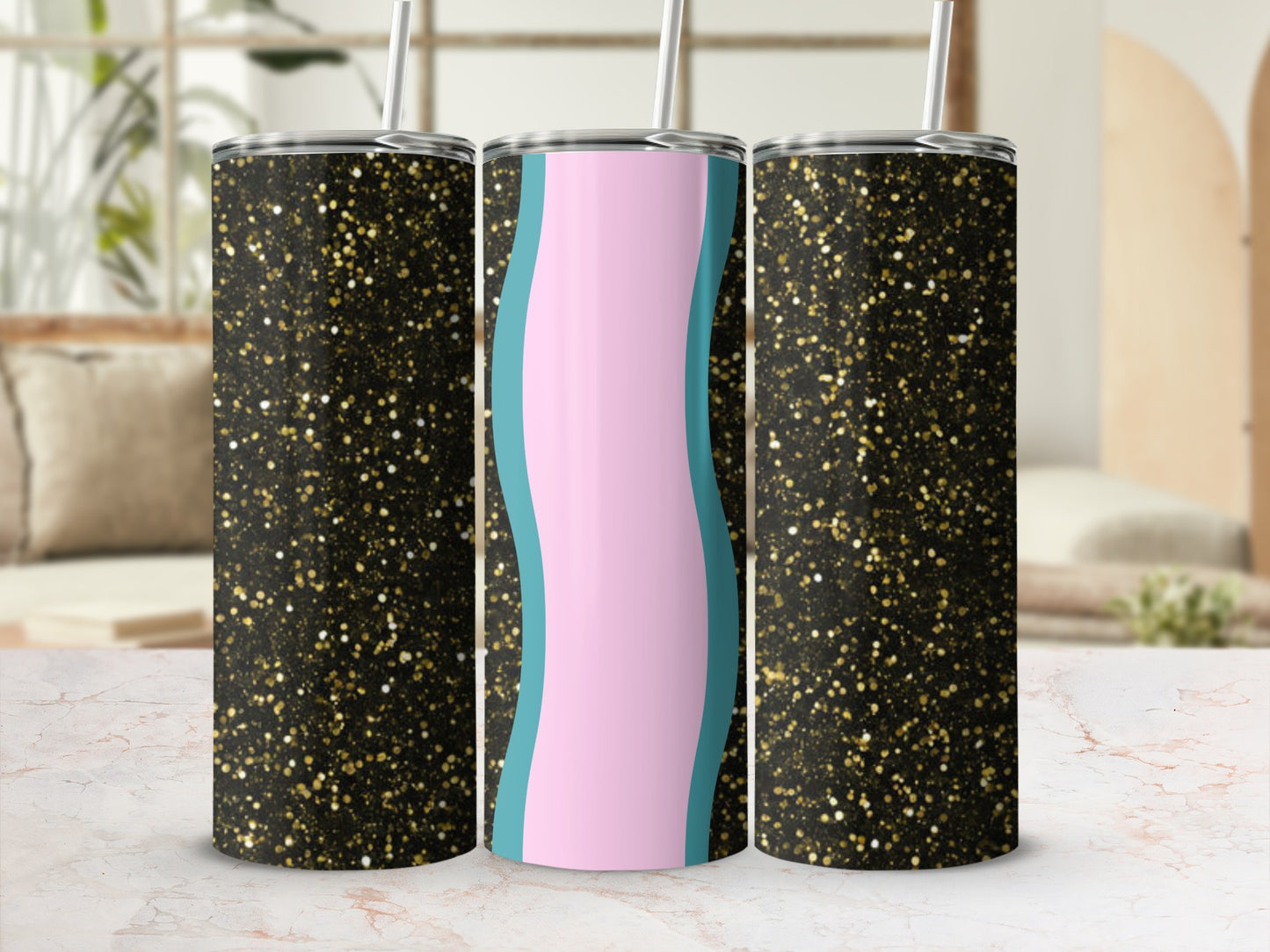 Three tumblers with black and gold glitter design and blue and pink wavy stripes.