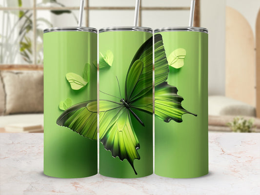 Green butterfly tumbler with straw on display.