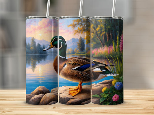 Mallard duck on rocky shore with colorful floral background.