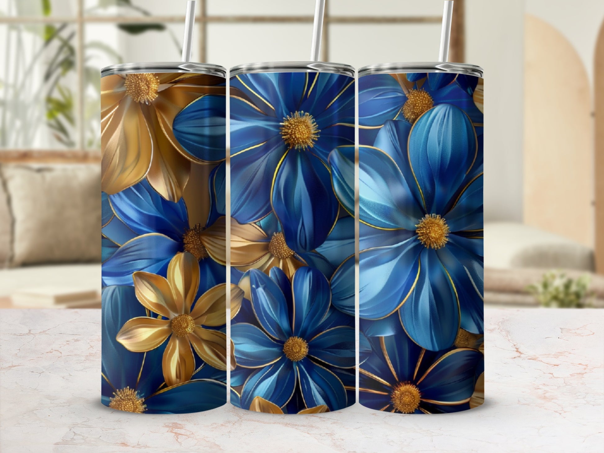 Three tumblers with blue and gold floral patterns.