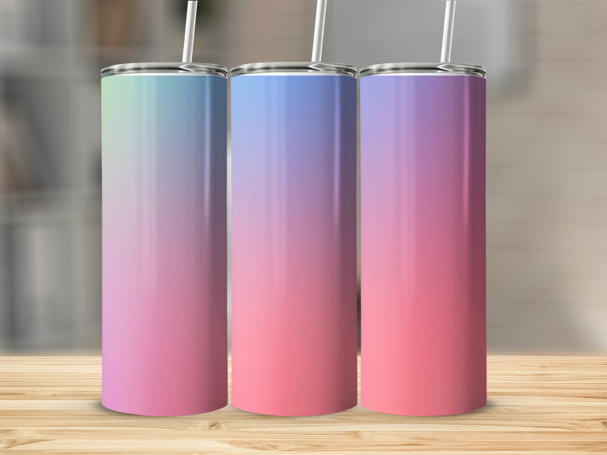 Three tumblers with straws feature a gradient of pastel green, blue, pink, and purple.