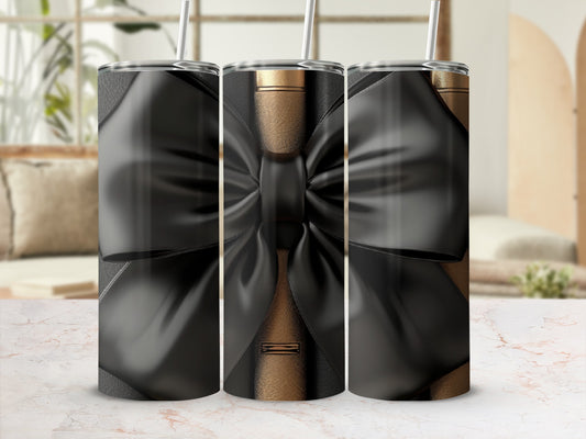 Three tumblers with black bow design against a blurred background.